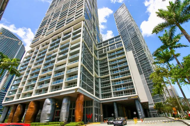 a view of a building with a street