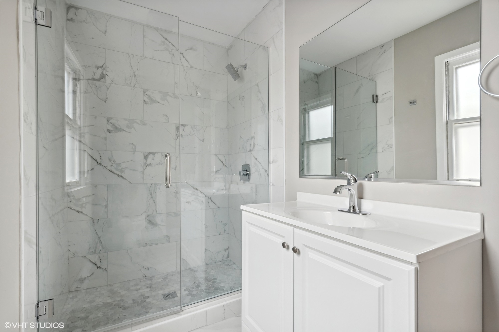 2490 Green Bay Road Highland Park, IL 60035 - Photo 12 of 29 a bathroom with a sink shower and a mirror
