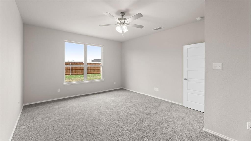 361 Deer Rdg Drive Aledo, TX 76008 - Photo 16 of 25 an empty room with windows and ceiling fan