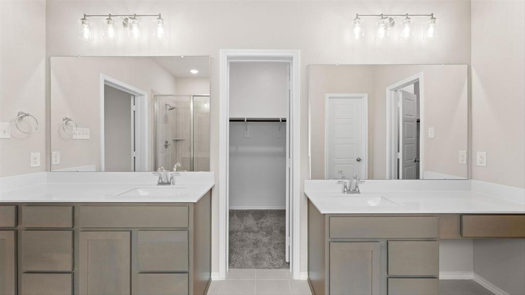 361 Deer Rdg Drive Aledo, TX 76008 - Photo 17 of 25 a bathroom with a sink and a mirror