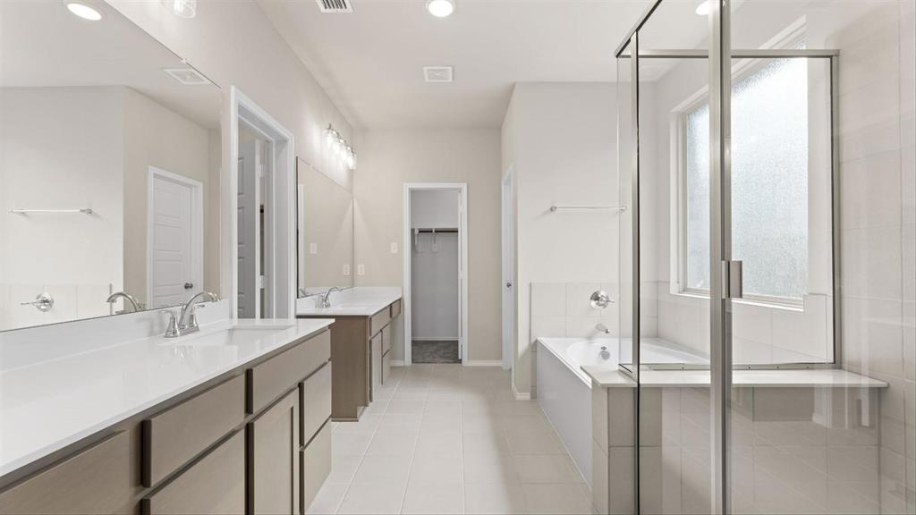 361 Deer Rdg Drive Aledo, TX 76008 - Photo 19 of 25 a spacious bathroom with a double vanity sink mirror and shower
