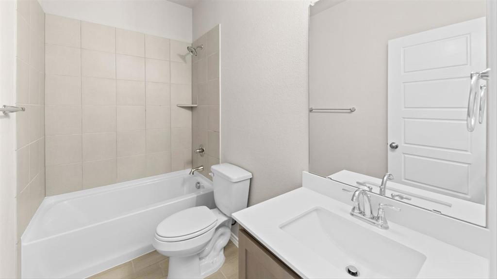 361 Deer Rdg Drive Aledo, TX 76008 - Photo 23 of 25 a bathroom with a sink toilet and shower