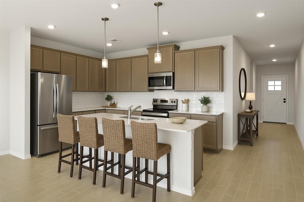 361 Deer Rdg Drive Aledo, TX 76008 - Photo 3 of 25 a kitchen with stainless steel appliances granite countertop a refrigerator a stove a sink a dining table and chairs