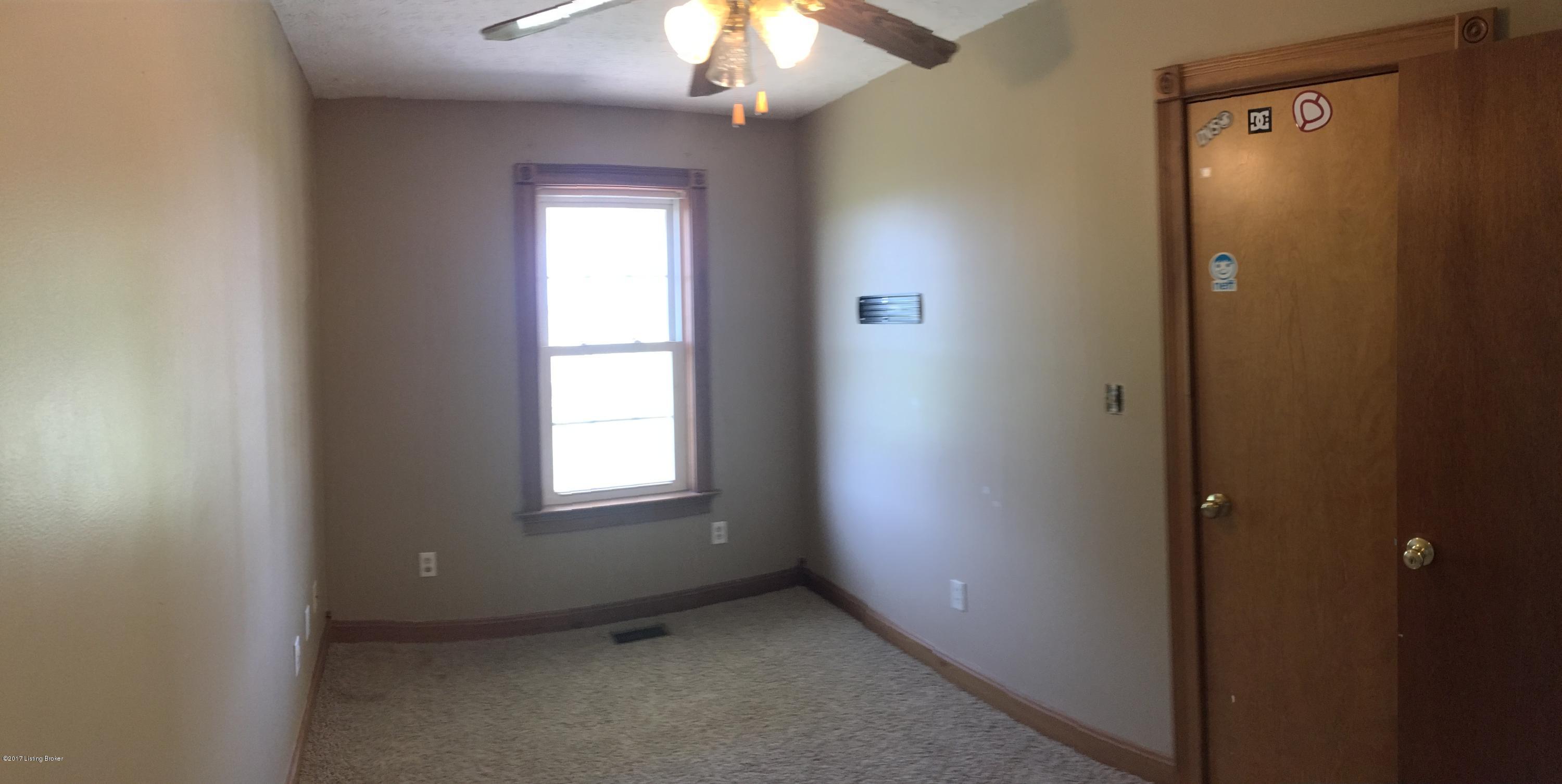 3388 Holy Cross Road Loretto, KY 40037 - Photo 11 of 21 The second bedroom is located the front of the home.