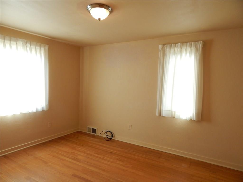 2009 Mohawk Road Upper St. Clair, PA 15241 - Photo 8 of 15 BEDROOM - Hardwood floor, center light fixture