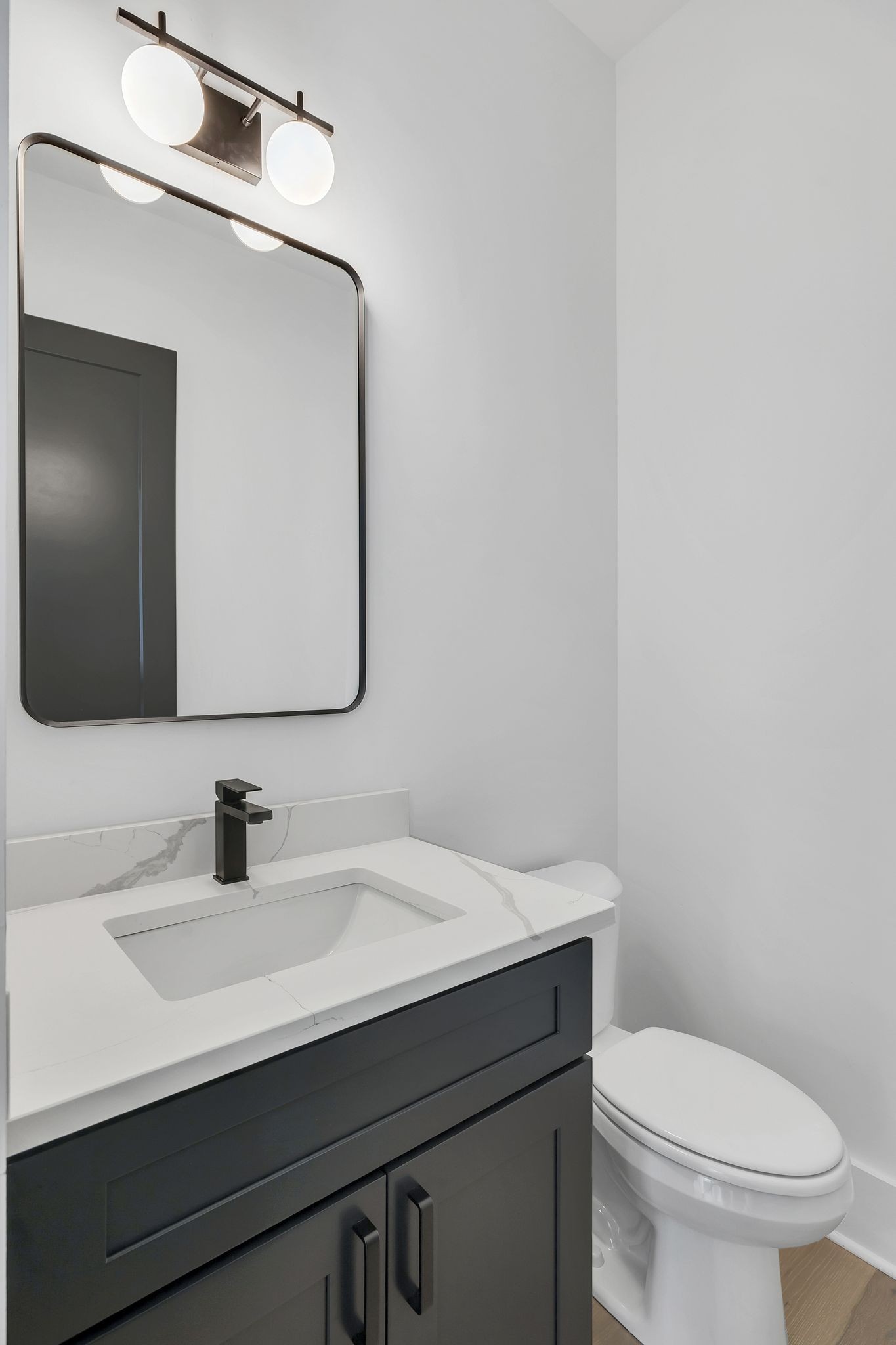 1607 Martha Washington Way Murfreesboro, TN 37130 - Photo 11 of 43 a bathroom with a toilet sink and mirror