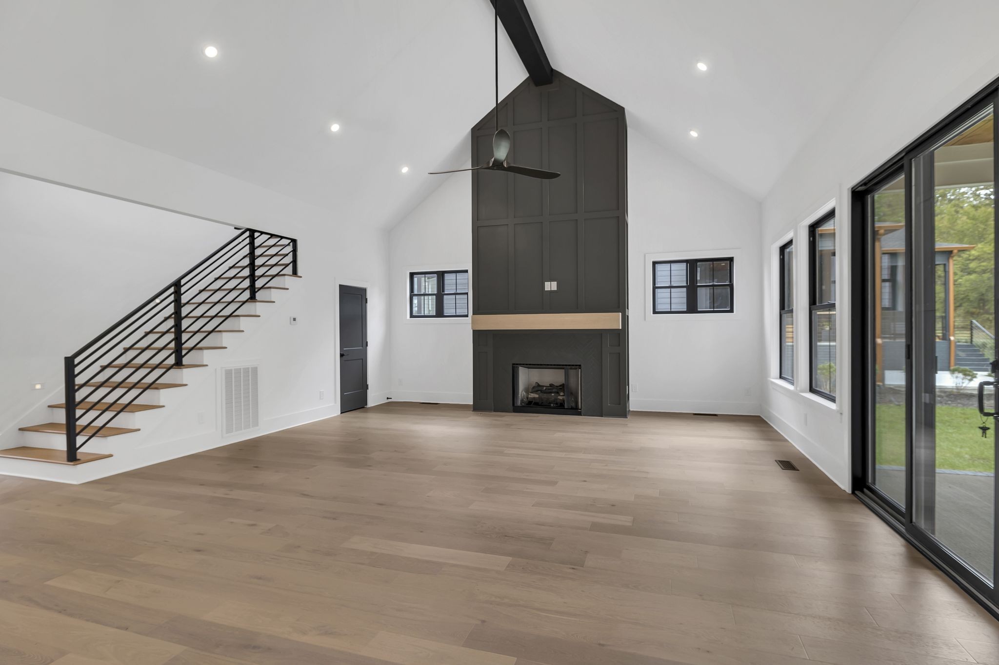 1607 Martha Washington Way Murfreesboro, TN 37130 - Photo 13 of 43 a view of an empty room with a fireplace and a window