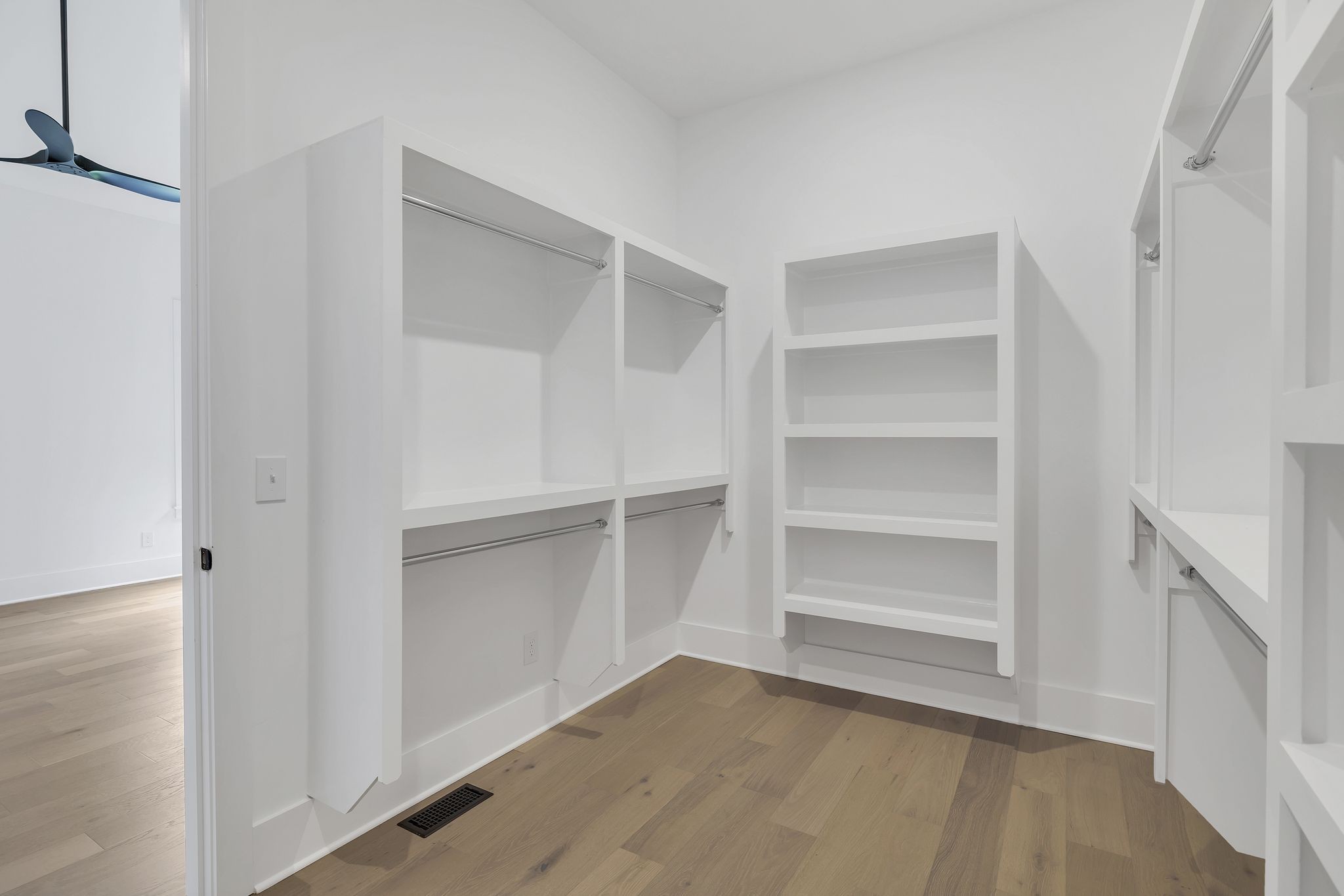 1607 Martha Washington Way Murfreesboro, TN 37130 - Photo 25 of 43 a view of an empty walk in closet with empty racks