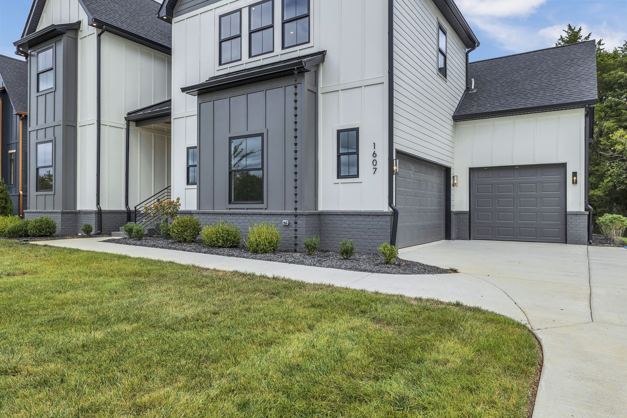 1607 Martha Washington Way Murfreesboro, TN 37130 - Photo 3 of 43 a front view of a house with garage