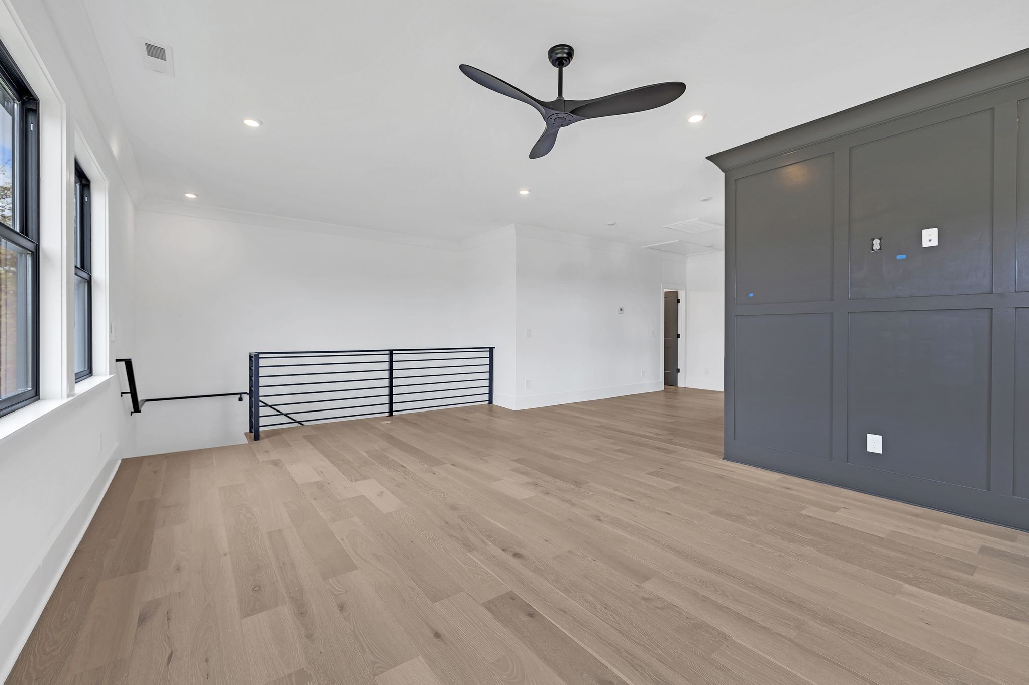 1607 Martha Washington Way Murfreesboro, TN 37130 - Photo 33 of 43 a view of a livingroom with a ceiling fan and wooden floor
