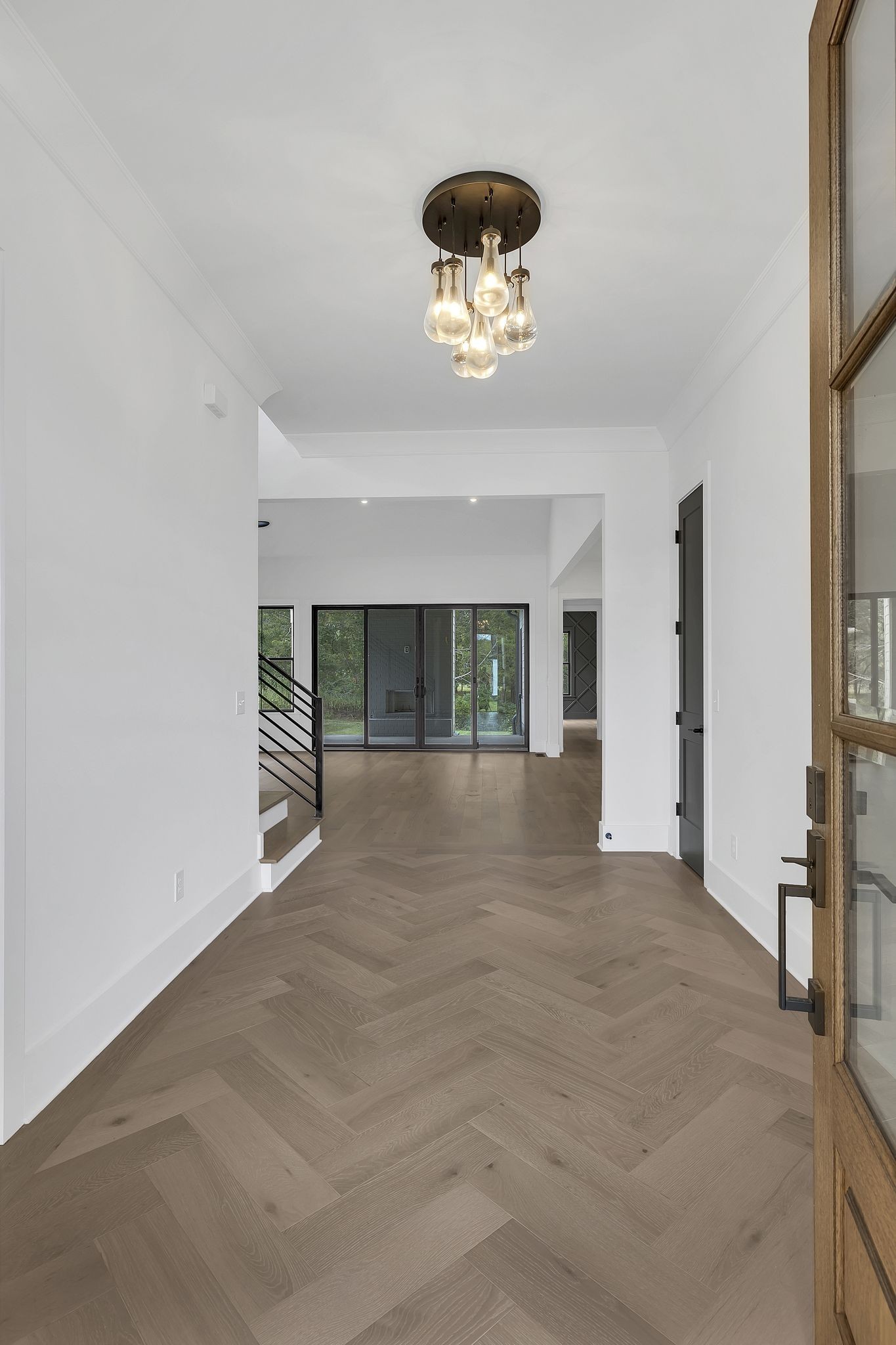 1607 Martha Washington Way Murfreesboro, TN 37130 - Photo 5 of 43 a view of an empty room with a fireplace and a large window