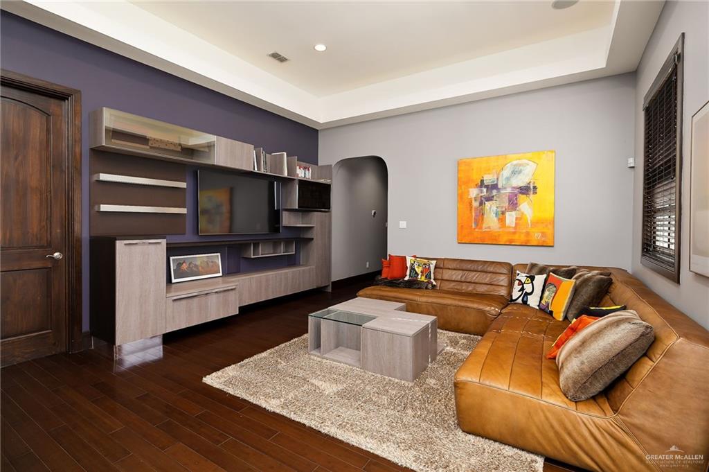 8901 North 2nd Street McAllen, TX 78504 - Photo 11 of 40 Italian crafted designer cabinetry in open area perfect for family movie nights