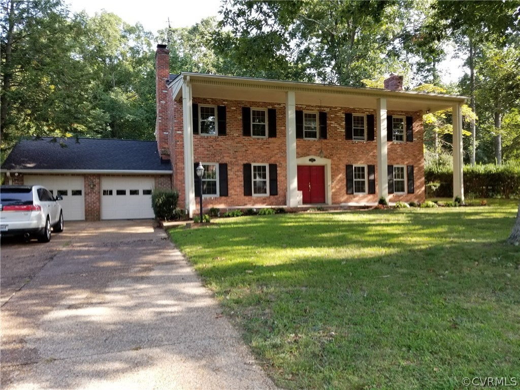 4117 Cresthill Road Chester, VA 23831 - Photo 1 of 40 a view of a house with a yard