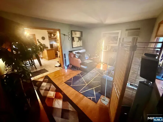 a view of a livingroom with furniture and windows