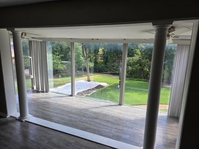 a view of backyard with porch