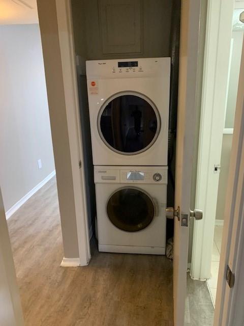7812 Royal Lane, Unit 210 Dallas, TX 75230 - Photo 20 of 23 a utility room with dryer and washer