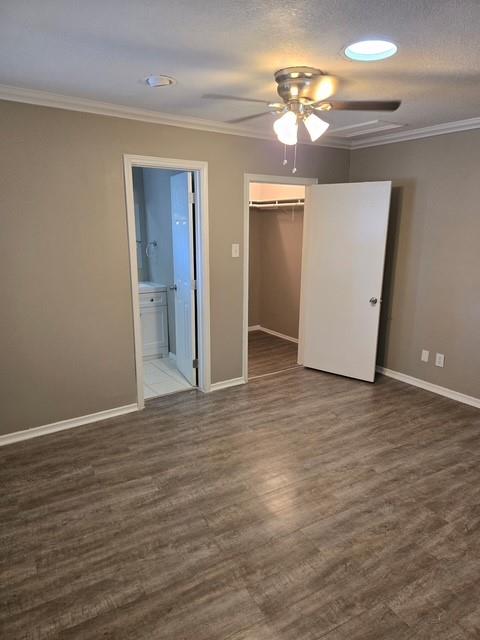 7812 Royal Lane, Unit 210 Dallas, TX 75230 - Photo 8 of 23 wooden floor in an empty room with a window