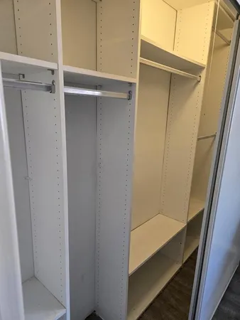 a bathroom with a glass door shower