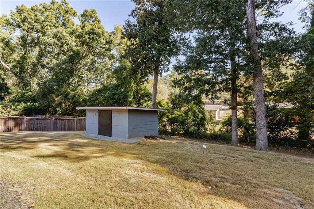 1944 Cindy Drive Decatur, GA 30032 - Photo 21 of 22 a swimming pool with outdoor seating and yard