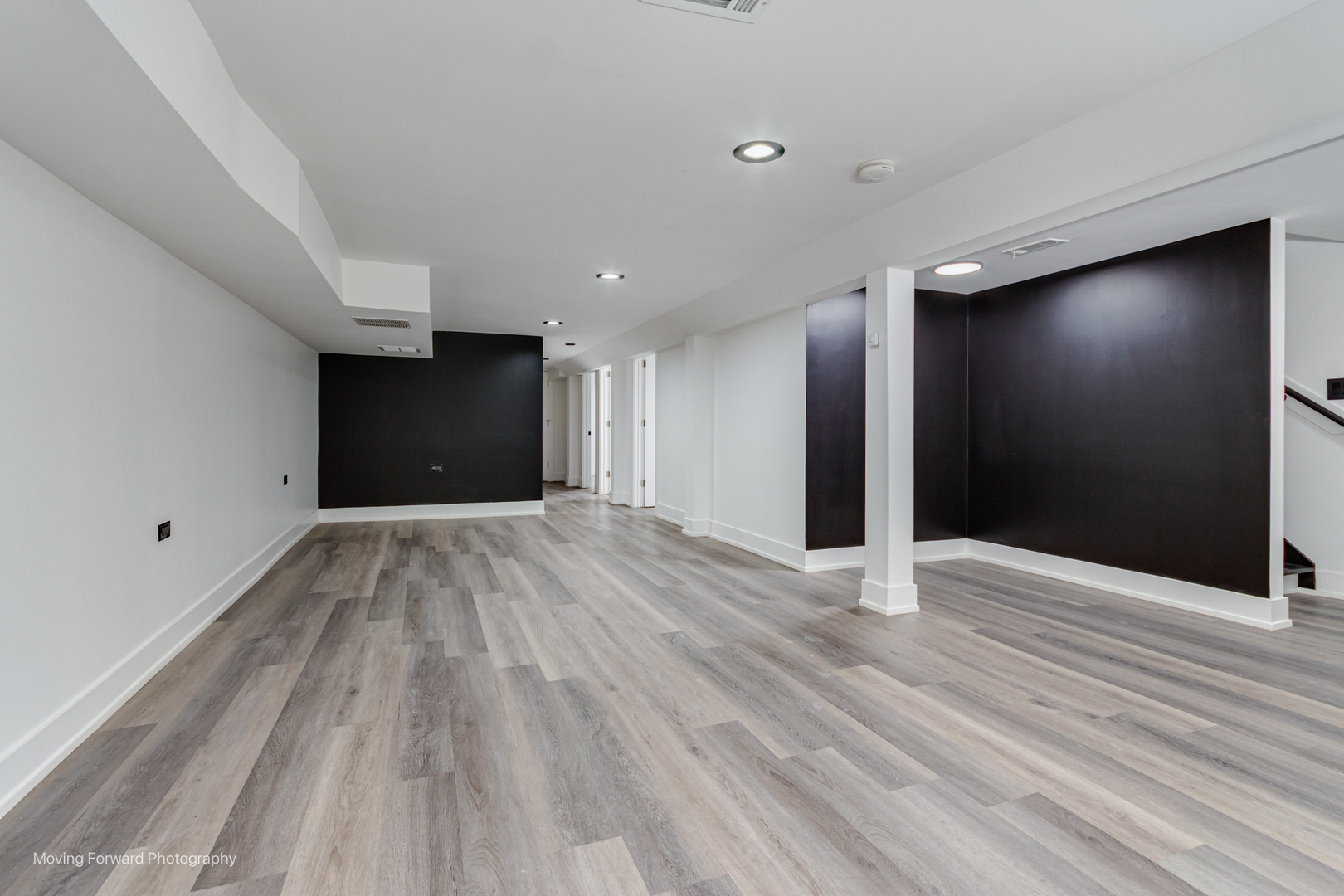 4941 West Iowa Street Chicago, IL 60651 - Photo 14 of 44 a view of an empty room with wooden floor