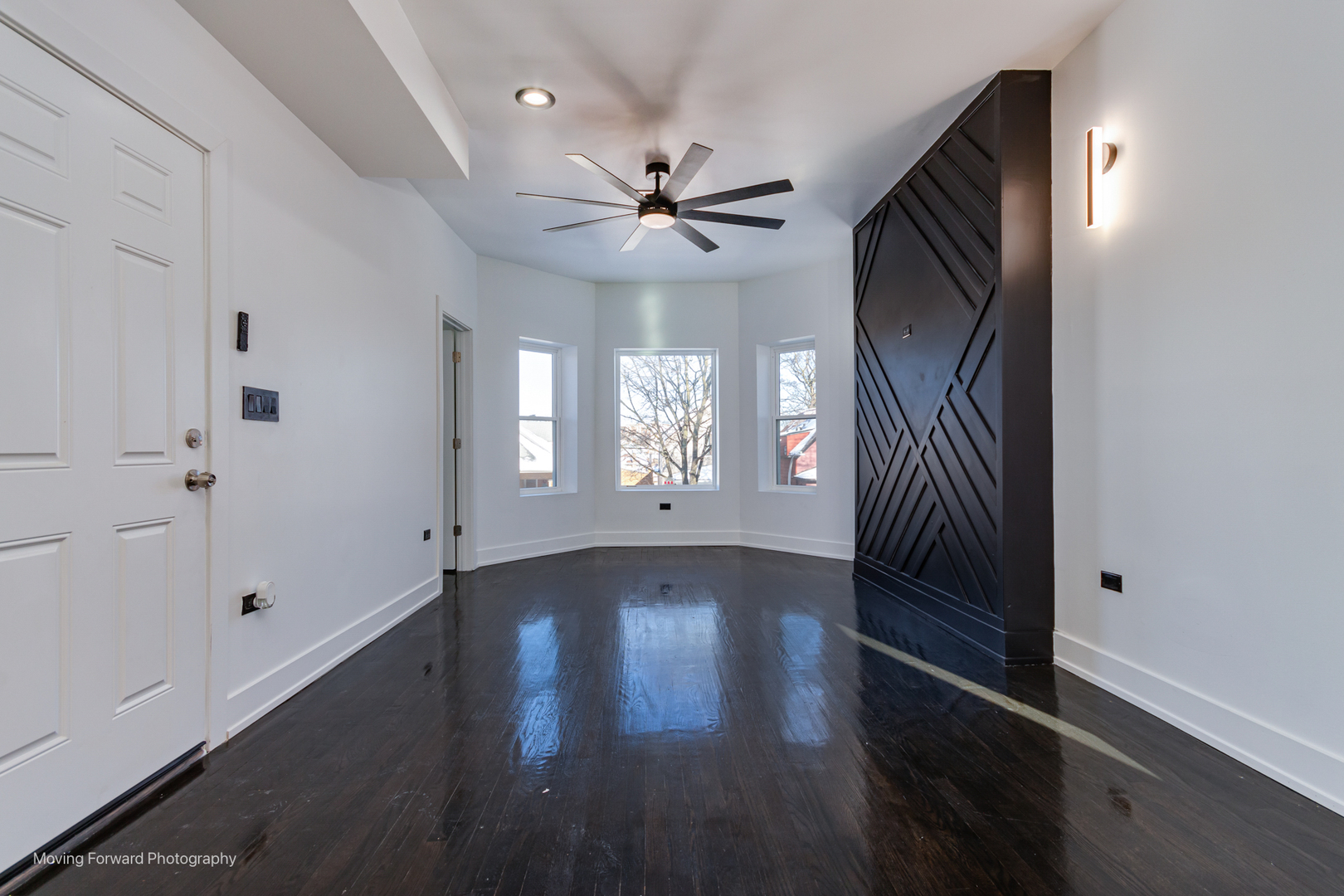 4941 West Iowa Street Chicago, IL 60651 - Photo 22 of 44 wooden floor in an empty room with a window
