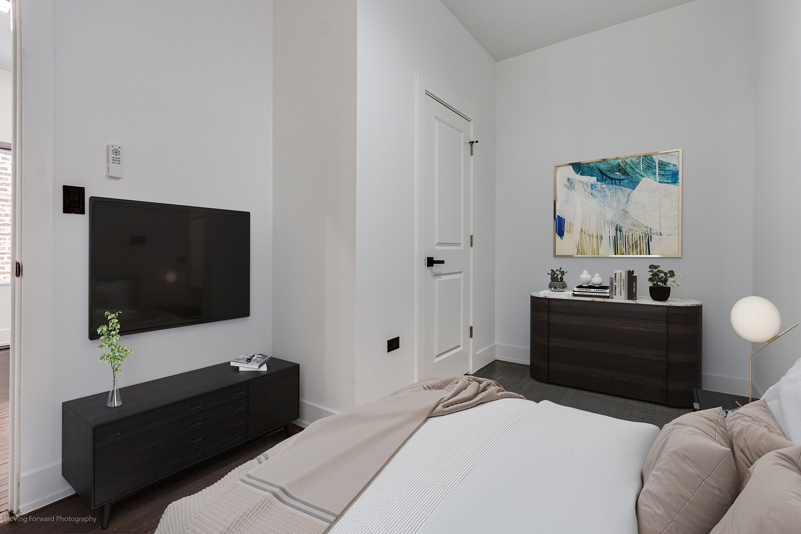 4941 West Iowa Street Chicago, IL 60651 - Photo 32 of 44 a living room with a bed furniture and flat screen tv