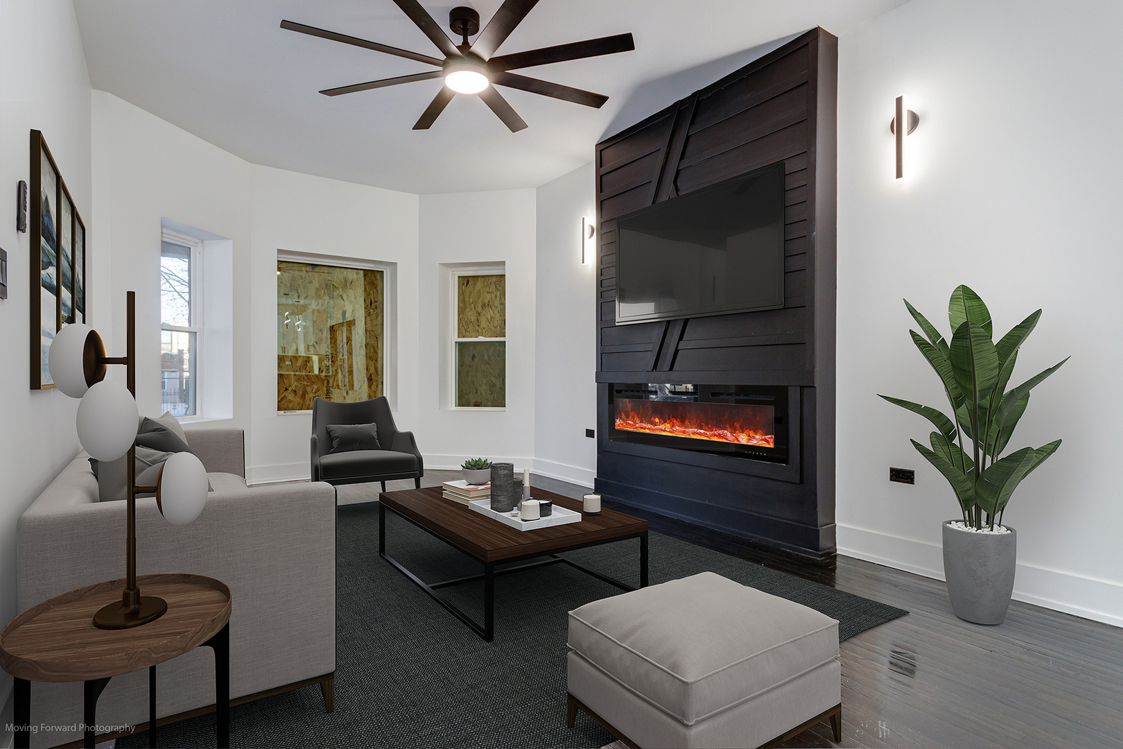 4941 West Iowa Street Chicago, IL 60651 - Photo 6 of 44 a living room with furniture a flat screen tv and a potted plant