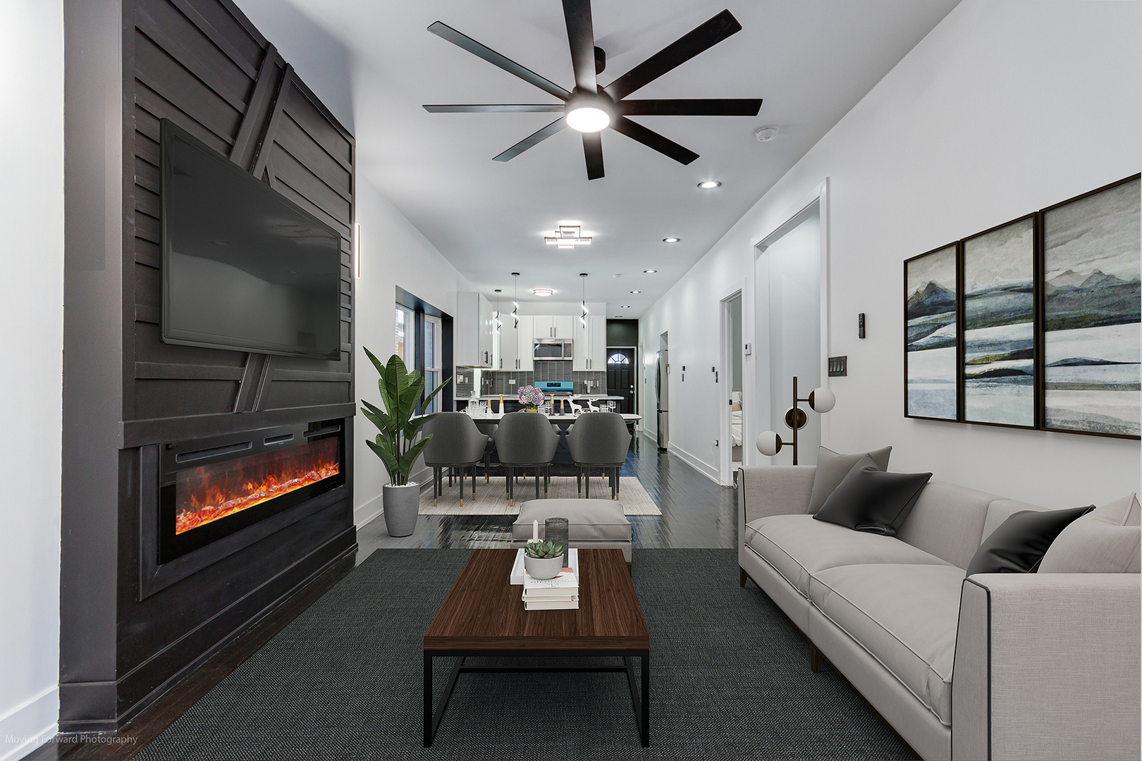 4941 West Iowa Street Chicago, IL 60651 - Photo 8 of 44 a living room with furniture a flat screen tv and a fireplace