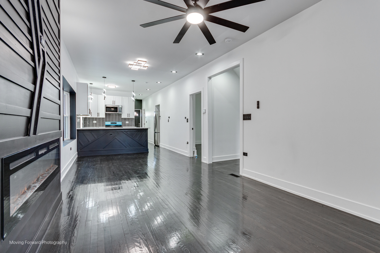 4941 West Iowa Street Chicago, IL 60651 - Photo 9 of 44 a view of a kitchen with a sink and a stove top oven