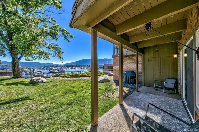 a view of a backyard with hardwood