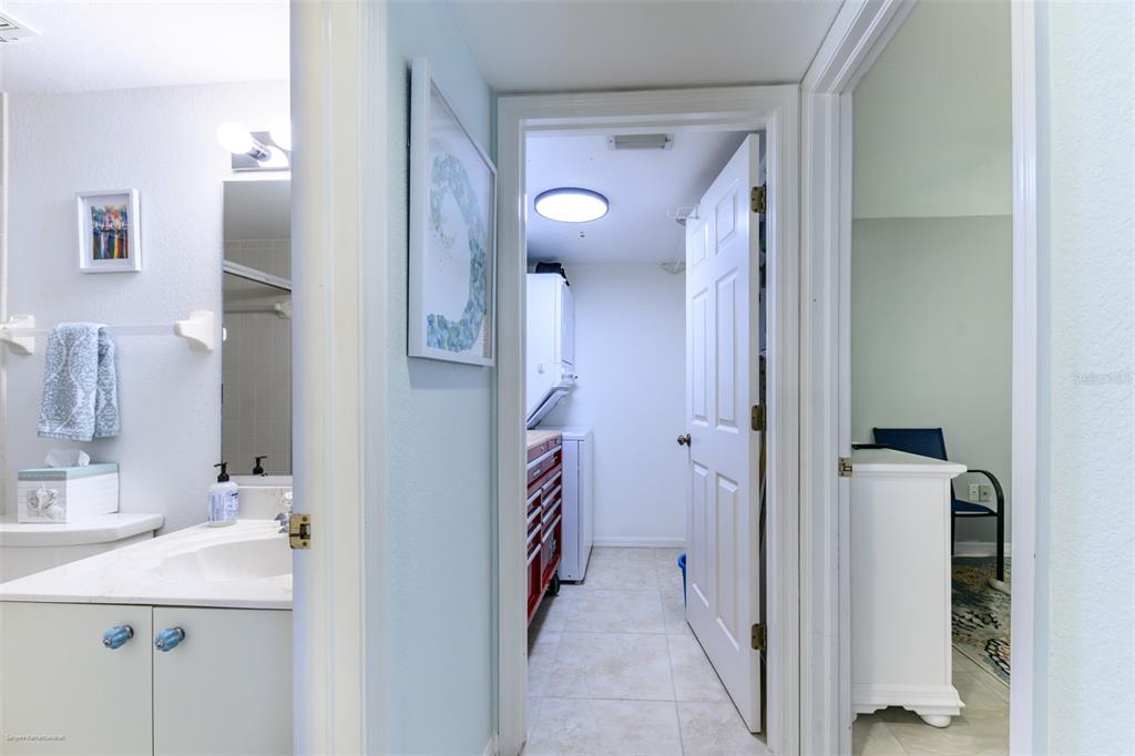 220 Coldeway Drive, Unit 112 Punta Gorda, FL 33950 - Photo 42 of 49 a bathroom with a sink and a mirror