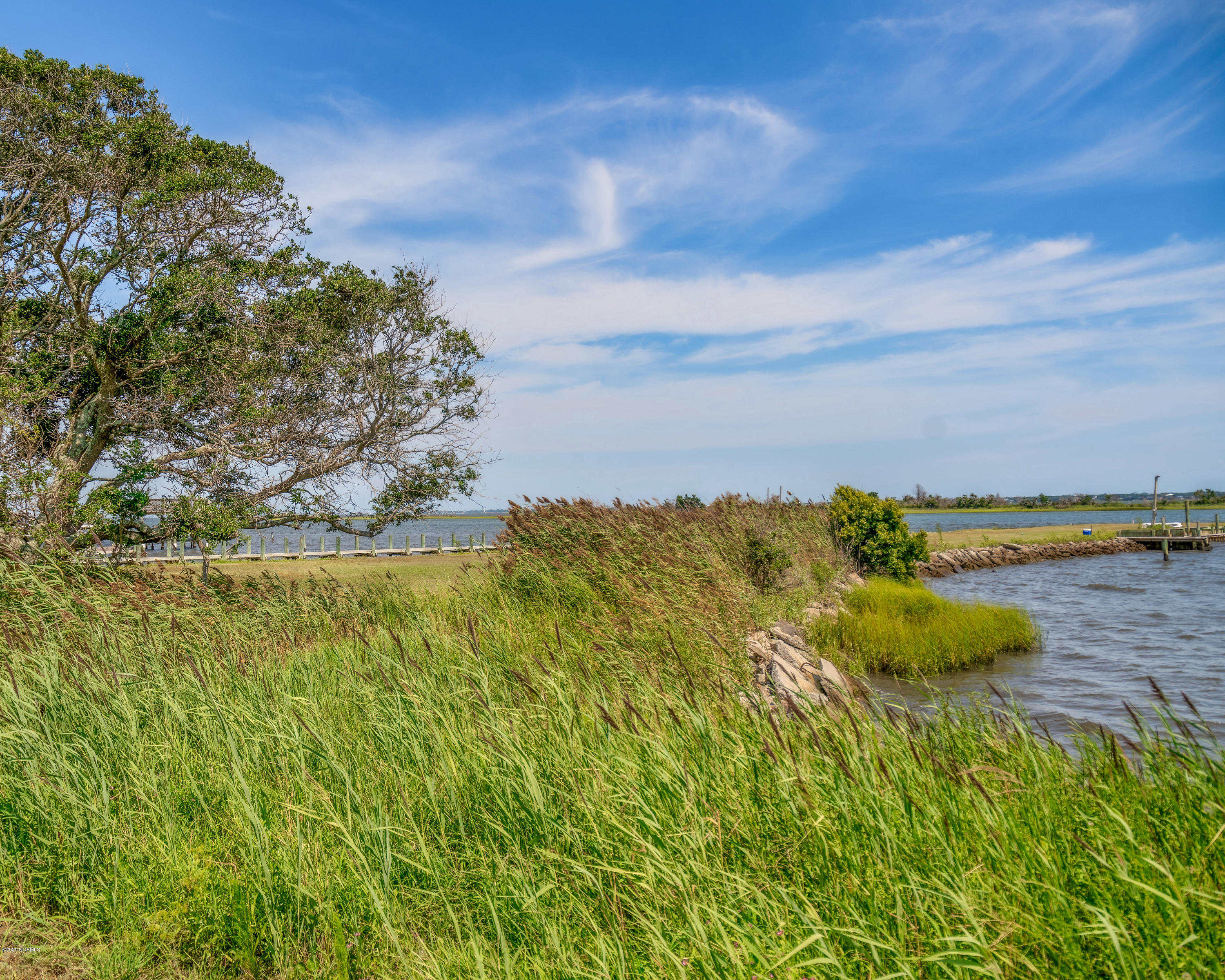 271 Live Oak Road Newport, NC 28570 - Photo 5 of 11 Bulkhead, tall grass and beauty!