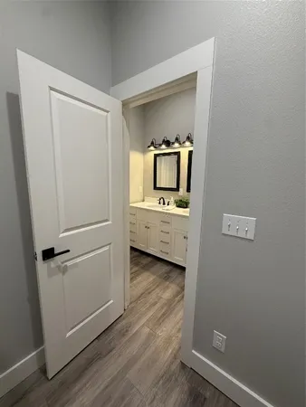 a view of a storage and utility room with washer and dryer