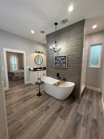 a view of living room with granite countertop furniture and chandelier