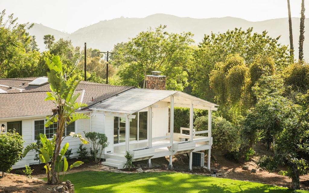 1520 Via Rancho Parkway Escondido, CA 92029 - Photo 84 of 89 a view of a house with backyard porch and furniture