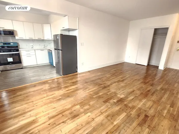 a view of a kitchen with a sink