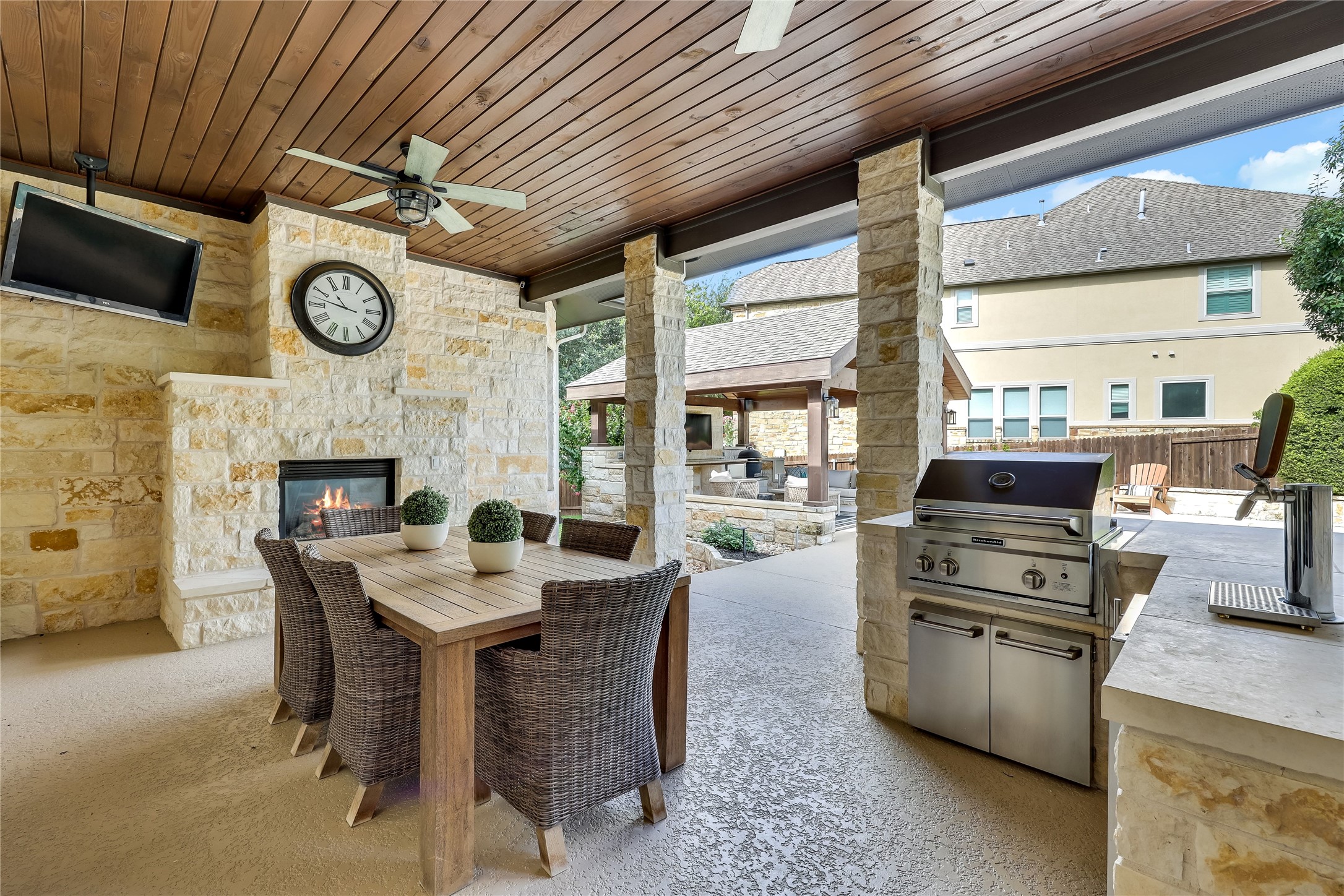 401 Bluff View Road Cedar Park, TX 78613 - Photo 3 of 40 An inviting outdoor living area, perfect for entertaining with a built-in grill and covered patio.