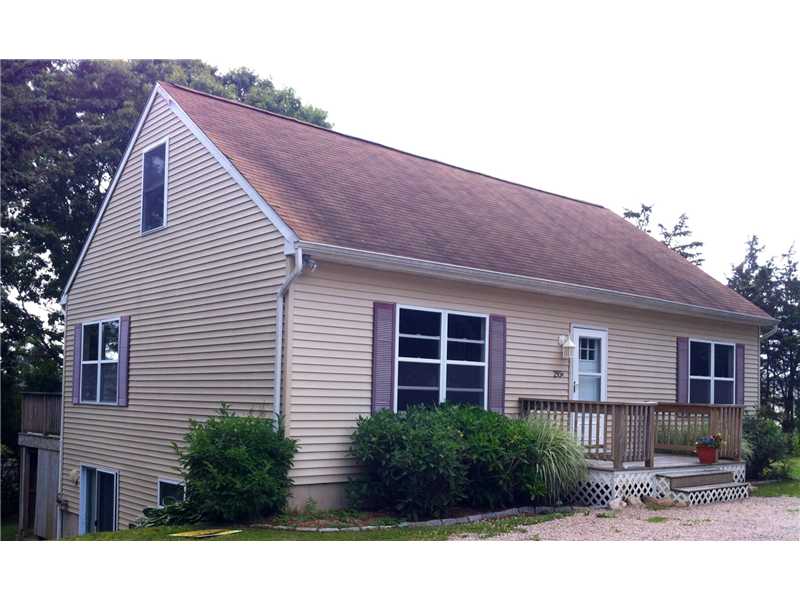 293 Shore Road Westerly, RI 02891 - Photo 1 of 9 Exterior Front. REAR DECK ,OUTDOOR SHOWER AND WALK OUT BASEMENT CAN BE OBSERVED