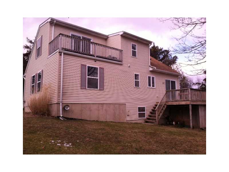 293 Shore Road Westerly, RI 02891 - Photo 3 of 9 Exterior Back. REAR DECK OFF KITCHEN AND DECK OFF SECOND FLOOR BEDROOM
