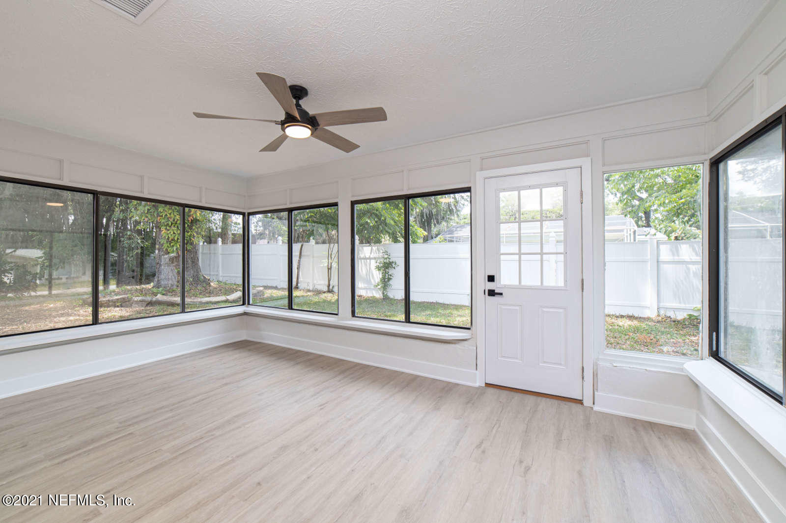 108 Linden Road St. Augustine, FL 32086 - Photo 15 of 36 wooden floor in an empty room with a window