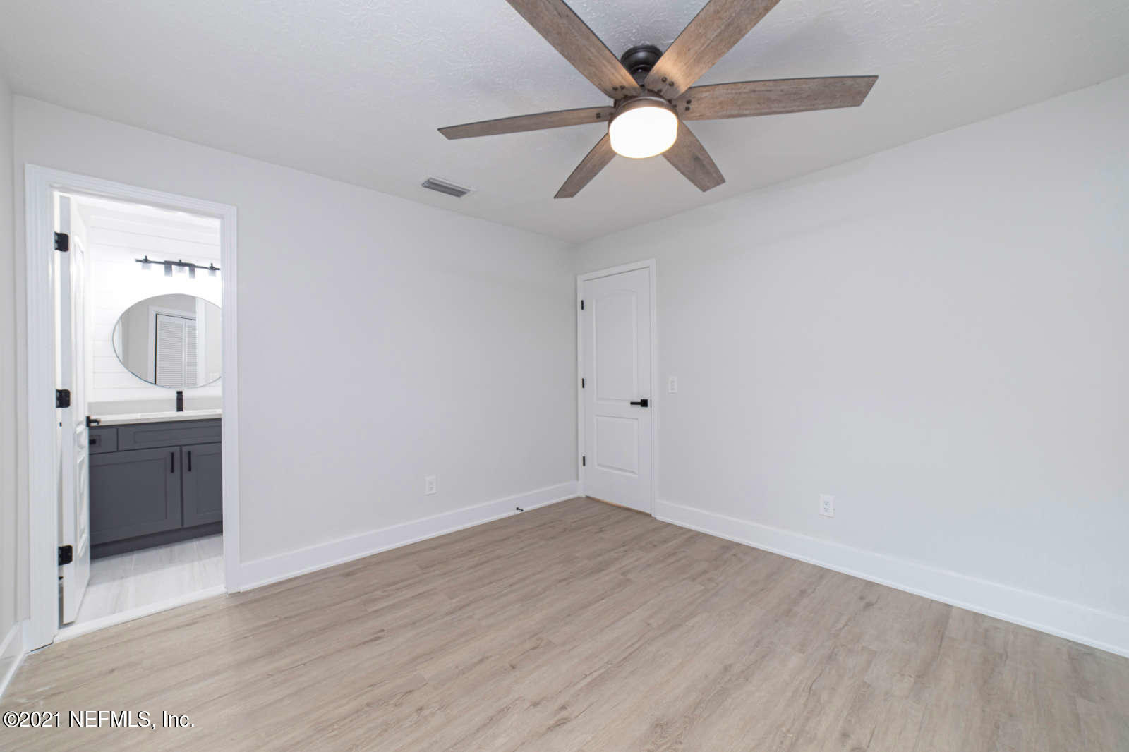 108 Linden Road St. Augustine, FL 32086 - Photo 19 of 36 wooden floor in an empty room with a window
