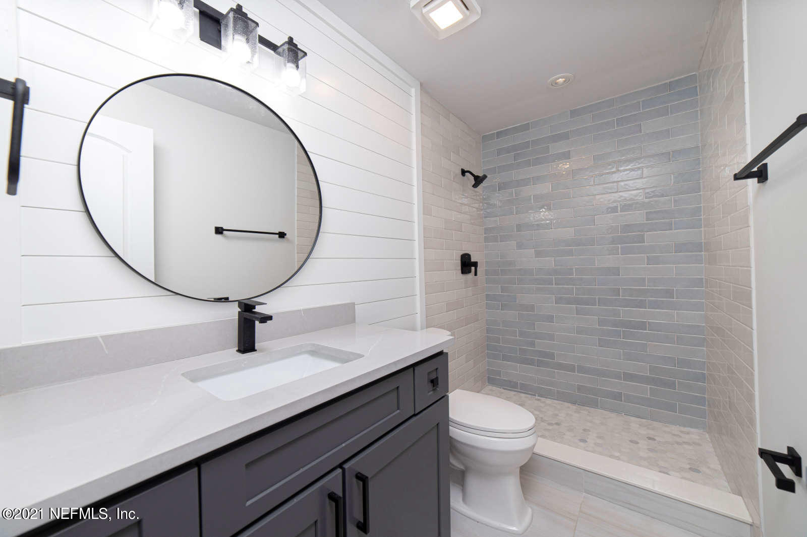 108 Linden Road St. Augustine, FL 32086 - Photo 24 of 36 a bathroom with a sink a toilet and shower