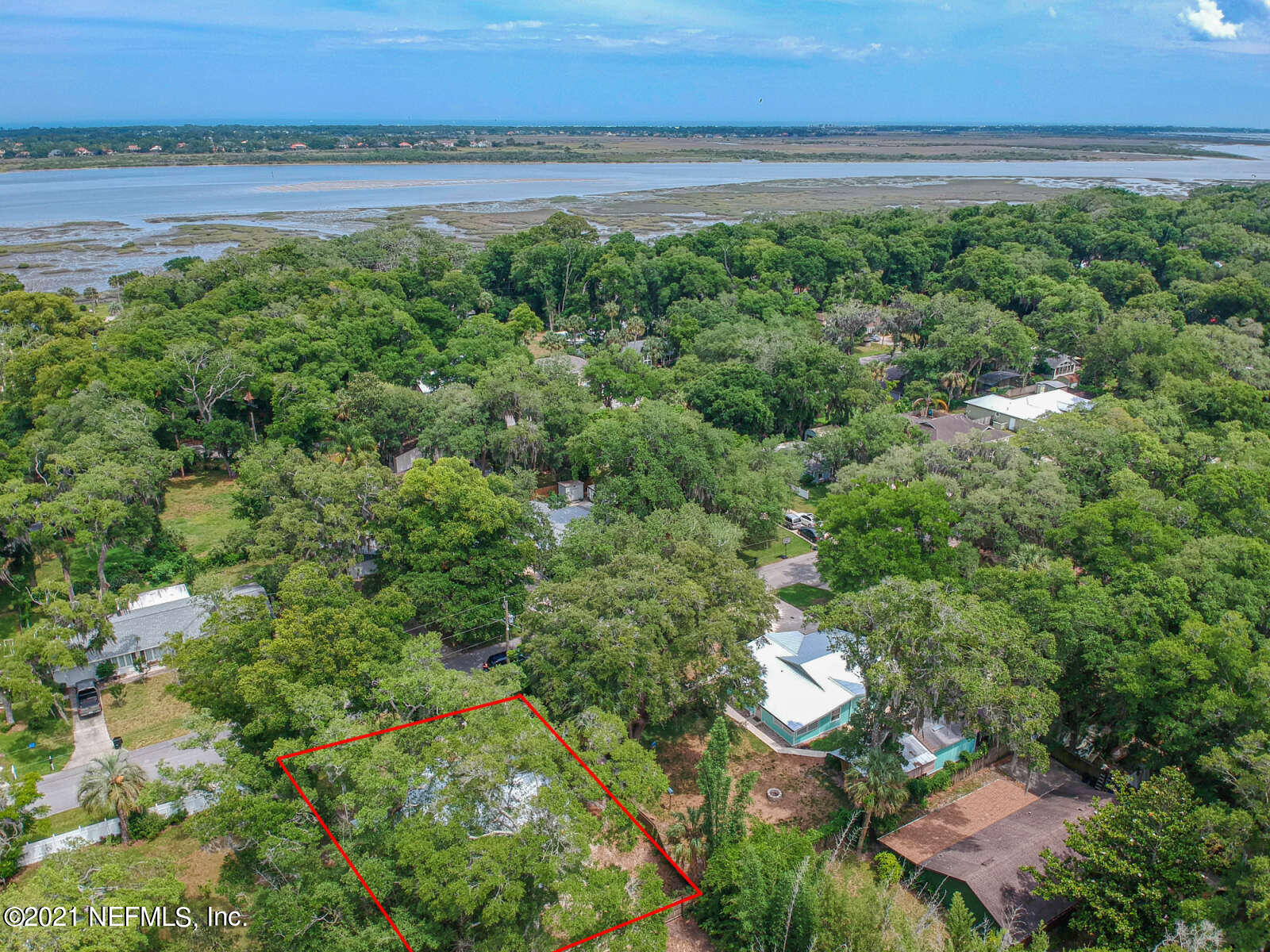108 Linden Road St. Augustine, FL 32086 - Photo 32 of 36 an aerial view of a house with a lake view