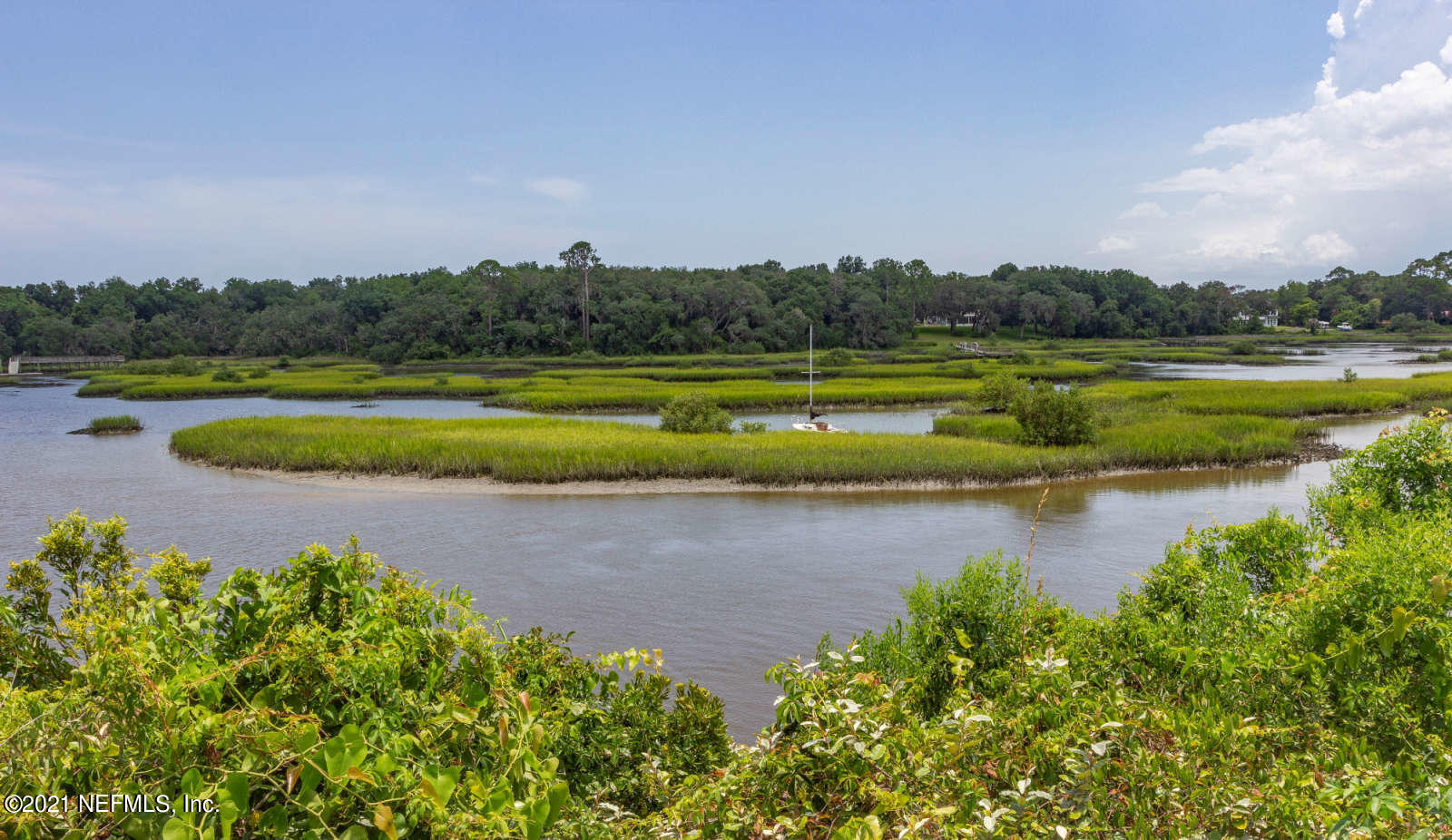 108 Linden Road St. Augustine, FL 32086 - Photo 36 of 36 a view of a lake with houses in the back