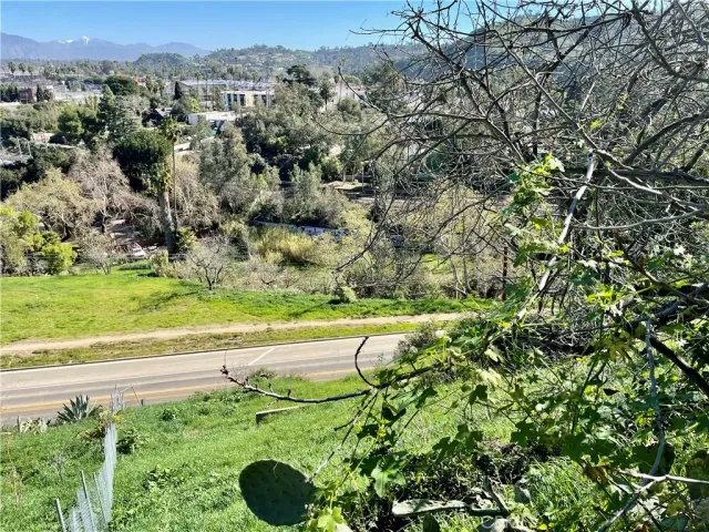 a view of a yard with an outdoor space and seating