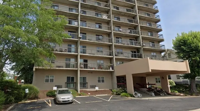 a car parked in front of a building
