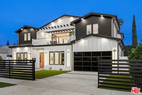 a front view of a house with entertaining space