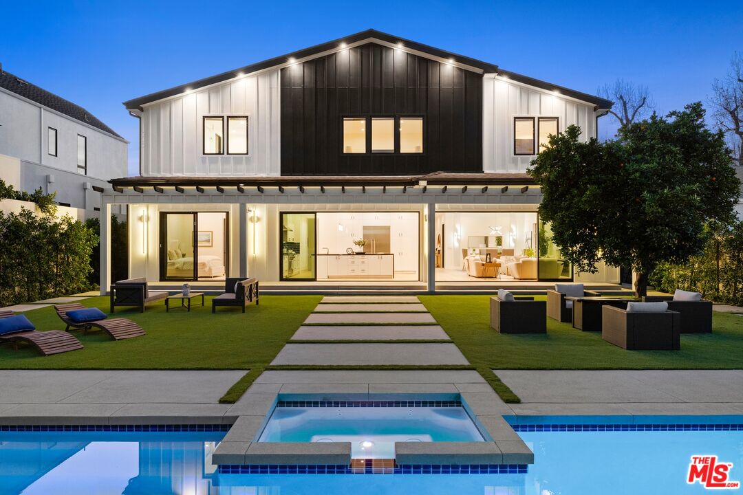 5012 Enfield Avenue Encino, CA 91316 - Photo 3 of 36 a front view of a house with entertaining space