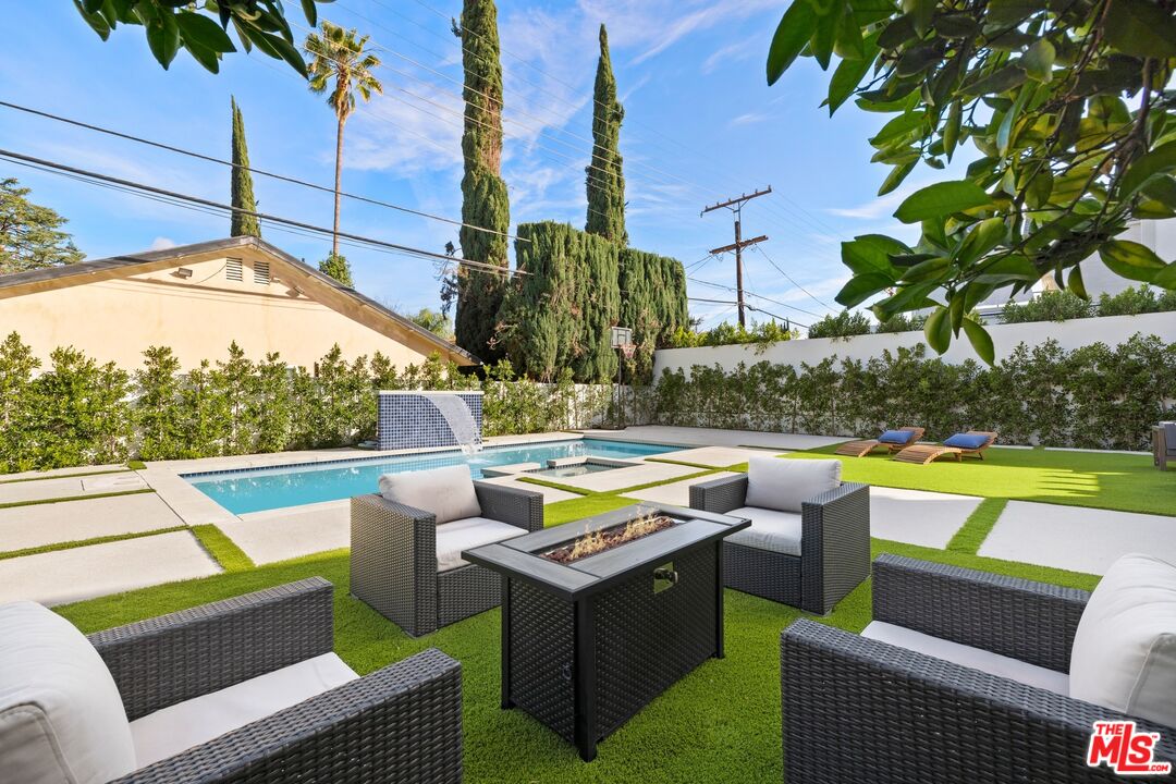 5012 Enfield Avenue Encino, CA 91316 - Photo 36 of 36 a view of swimming pool with outdoor seating
