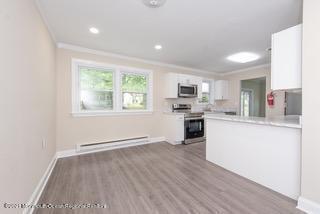 6 Churchill Road Whiting, NJ 08759 - Photo 14 of 30 a view of a kitchen with microwave and cabinets